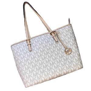 Michael Kors jet set tote, white and crème color with gold hardware.